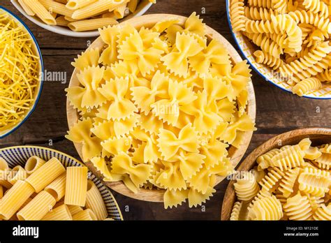 Different Types Of Raw Pastas Such As Fusilli Penne Rigate Radiatori