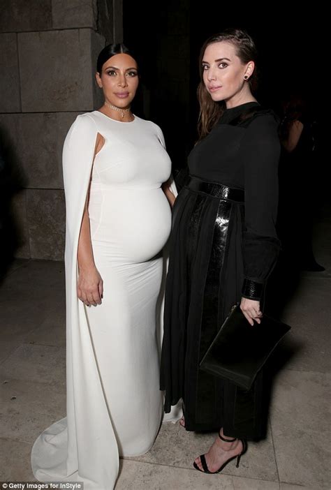 Pregnant Kim Kardashian Shows Off Her Bump In Caped Dress For Instyle