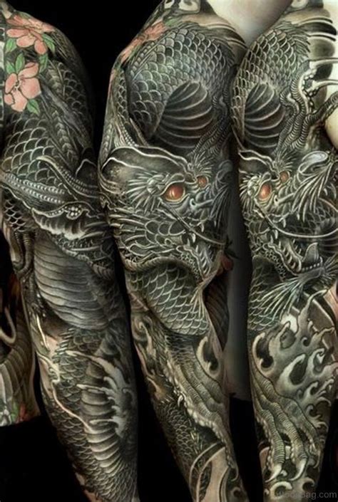 Tattoos On The Arms And Legs Of People With Dragon Tattoo Designs In