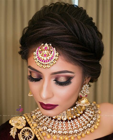 You will have to gather all the long hair for creating a bun and leave the shorter strands. Pin by Parul Arora on aBridal photography | Bridal makeup ...