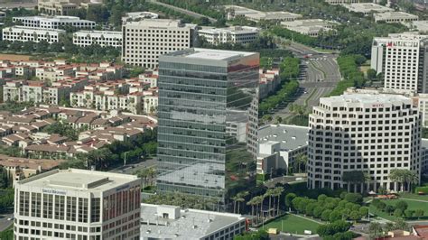 7 6K Stock Footage Aerial Video Orbiting An Office Building At Irvine