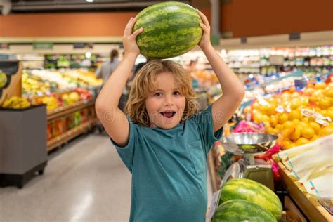 Kid With Watermelon Shopping In Supermarket Kids Buying Groceries In