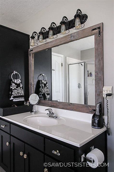 Since our bathroom makeover was pretty budget friendly, we decided to frame the bathroom mirrors. DIY Stick-On Mirror Frame | Diy mirror frame bathroom ...