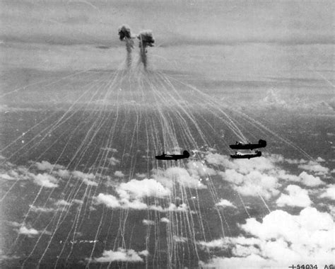 Japanese Zeroes Drop White Phosphorous Air Burst Bombs On B 24 Bombers