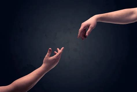 Hand About To Touch Another One Stock Photo By ©ra2studio 180557336