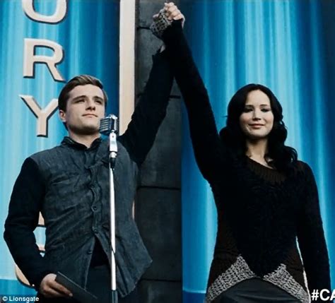 Watch Katniss And Peeta Fake It For The Cameras In First Hunger Games Catching Fire Tv Spot