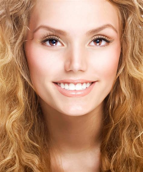 Beautiful Healthy Smiling Girls Face With Curly Hair And Healt Dr