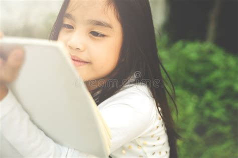 Asian Young Girl Read A Book Stock Photo Image Of Child Lovely