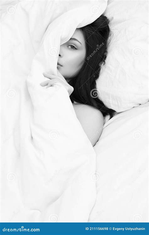 Lifestyle Portrait Of Brunette Girl On Bed Stock Photo Image Of Lips