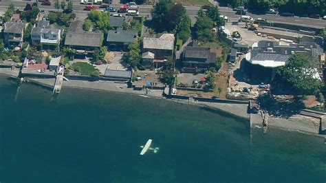 Photos Plane Crashes And Sinks In Water Near Seattle Occupants Escape