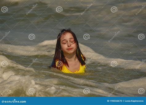Girl At Sea Teenager Summer Vacation Sand Sunny Day And The Sea