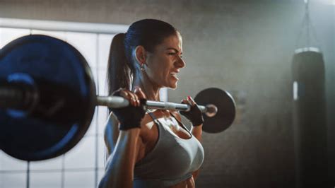 Woman Barbell Overhead Stock Photos Pictures And Royalty Free Images
