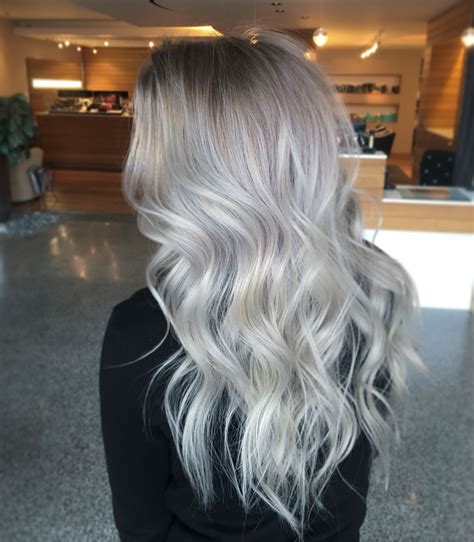A showstopper in its own right, strawberry red blonde hair is a fresh, somewhat unusual hue that's also more difficult to maintain, lending it a more luxurious, expensive. Silver blonde hair | Silver blonde hair, Silvery blonde ...