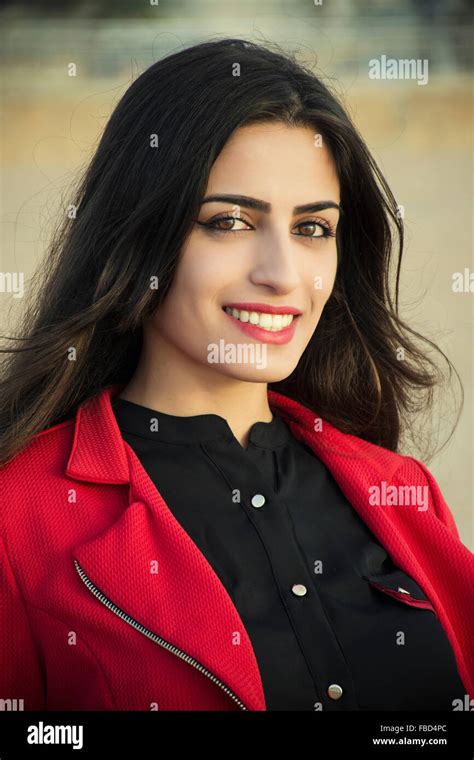 Beautiful Young Woman Smiling Outdoors Stock Photo Alamy