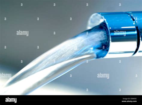 Water Flowing From Tap Stock Photo Alamy