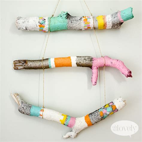 Diy Painted Sticks Wall Hanging Tutorial Oh So Lovely Blog