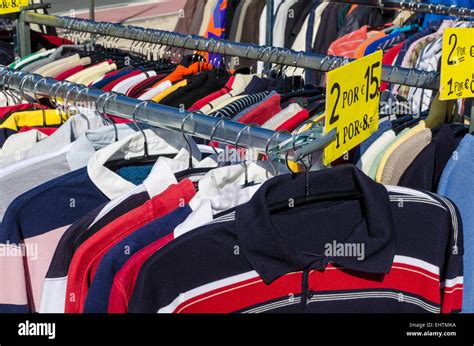 Assorted Second Hand Clothes On A Flea Market Stall Stock Photo Alamy