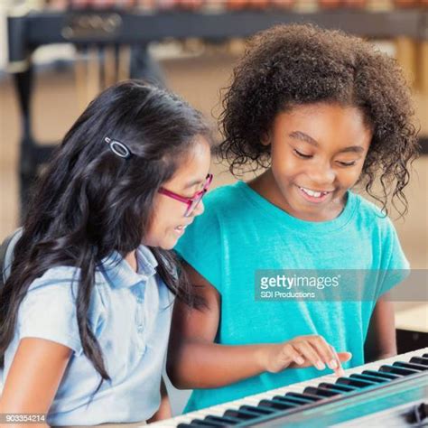 Black Girl Playing Piano Photos And Premium High Res Pictures Getty