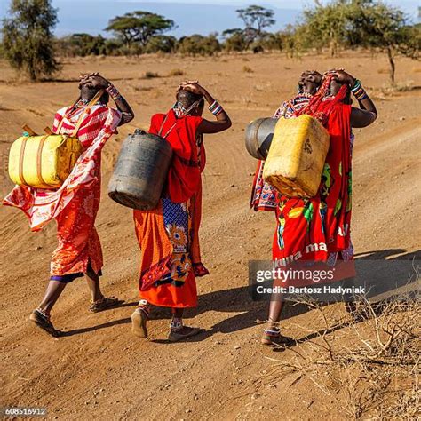 4464 African Women Carrying Water Stock Photos High Res Pictures And