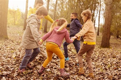 Children Playing In The Park Stock Photo Image Of Adolescent Ethnic