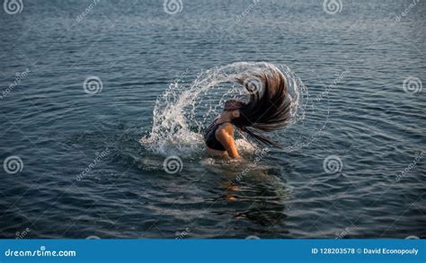 Teen In Water Flipping Her Hair Stock Photo Image Of Beach Spray