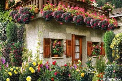 It was built as a winter garden with areas for work and rest of josip broz with an area of 902 square metres (9,710 sq ft) near the residence where he lived. Small house in flowers - GardenPuzzle - online garden ...