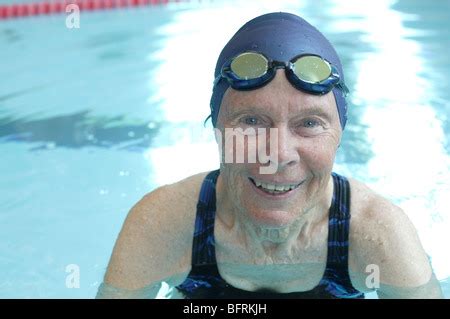 Mature Woman In Swimming Pool Stock Photo Alamy
