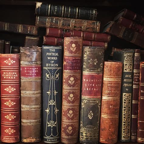 Old Books Are Lined Up On A Shelf