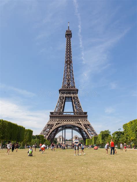 No one could imagine paris today without its signature spire. PARIS - JULY 27: Tourists At The Eiffel Tower On July 27 ...