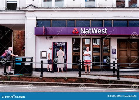 Natwest High Street Retial Bank Sign And Logo People Withdrawing Cash