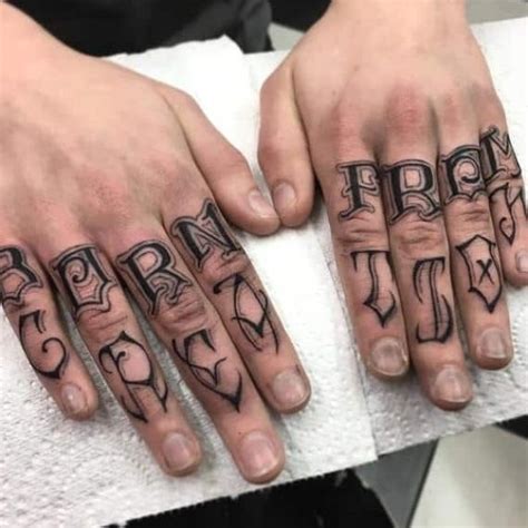Brass Knuckles Tattoo On Hand