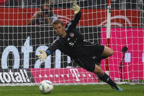 Information about manuel neuer diving saves. The football player of Bayern Manuel Neuer catching a ball ...