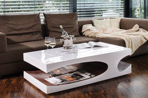 Perfekter couchtischanonymer rezensentder couchtisch ist einfach groß genug um alles mögliche drauf zu stellen und klein genug damit es dezent ausschaut im wohnzimmer. Couchtisch 120x70x37 cm weiß/Walnuss Hochglanz, Made in ...