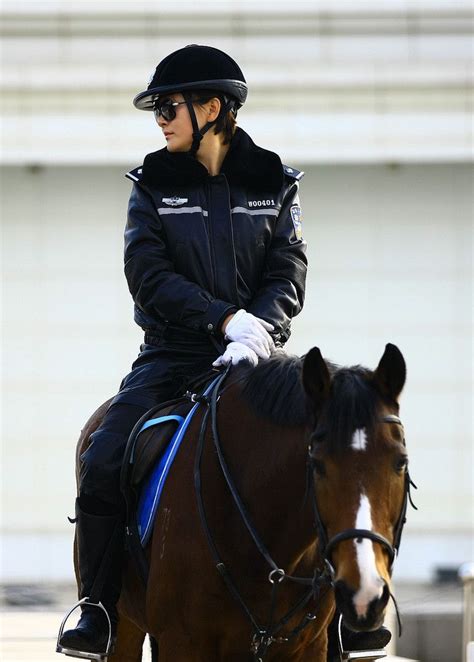 Dalians Mounted Policewoman In Full Leather Uniform Winter Jackets