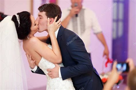 A Passionate Kiss Of Just Married Couple During Their