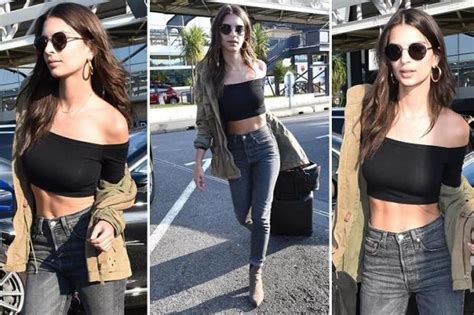 Emily Ratajkowski Flashes Her Toned Stomach As She Lands In France
