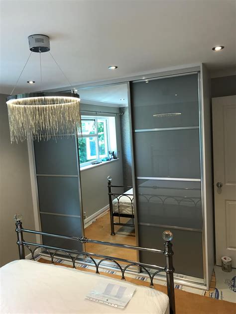 Uk walk in wardrobes combined with a sliding door system is the very latest totally flexible dressing room system from walkin wardrobe store.co.uk. Choose your glass and trim - make it your own. | Sliding ...