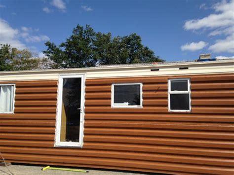 Un bardage en bois ? TOLE BARDAGE IMITATION BOIS - FRANCE PROFILAGE