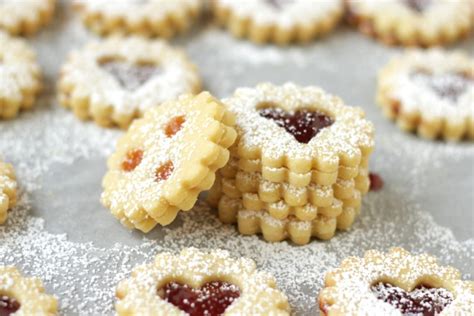 Austrian husarenkrapferl cookies, an almond shortbread dusted with icing sugar & finished off with a dollop of jam, will be the talk of the how about a batch of austrian husarenkrapferl cookies? Traditional Austrian Linzer Cookies & Jam Thumbprints - Living on Cookies
