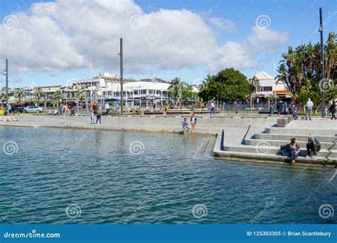People Walk Along Harbor Edge Tauranga City Waterfront Playground And
