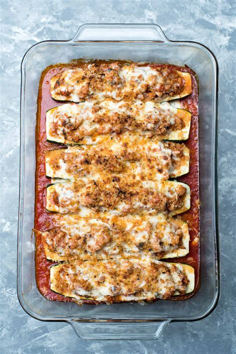 Delicious, low carb bbq chicken stuffed zucchini boats topped with cheddar cheese. Italian Stuffed Zucchini Boats | Valerie's Kitchen