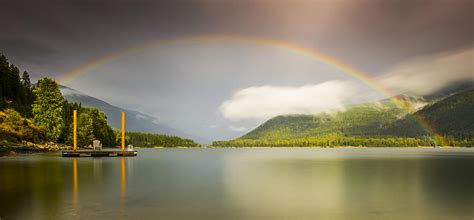Rainbow Across The Lake Photograph By Joy Mcadams Fine Art America