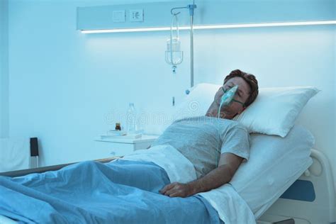 Patient Sleeping And Wearing An Oxygen Mask Stock Image Image Of