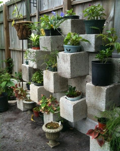 Covering a cinder block wall with surface bonding cement increases its water resistance & durability. C a y l a w r a l: Cinder block garden design