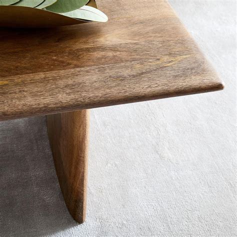 Brown/black medium round wood coffee table with storage shelf. Anton Solid Wood Coffee Table - Rectangle | west elm Australia