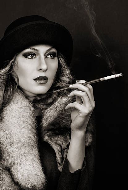 smoking cigarette women fur banco de fotos e imágenes de stock istock