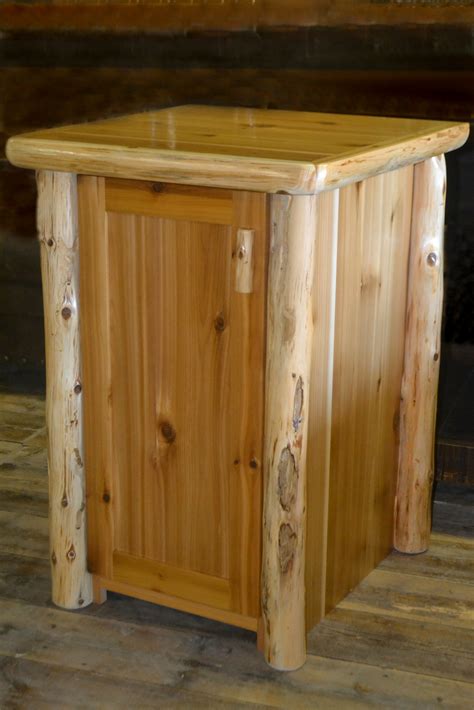 I hung my cabinet can on the outside of a lower cabinet door to the right of my kitchen sink — no more sticky hands having to open the cabinet door to throw out garbage. Timberland Trash Can Cabinet | Rustic Furniture Mall by ...
