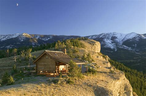 Buy prefab cabins from montana structures. A Small Log Cabin Perched Cliffside in Montana