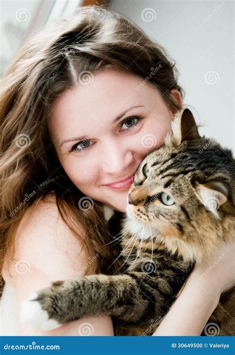 Smiling Brunette Girl And Her Cat Over Stock Photo Image Of Claws