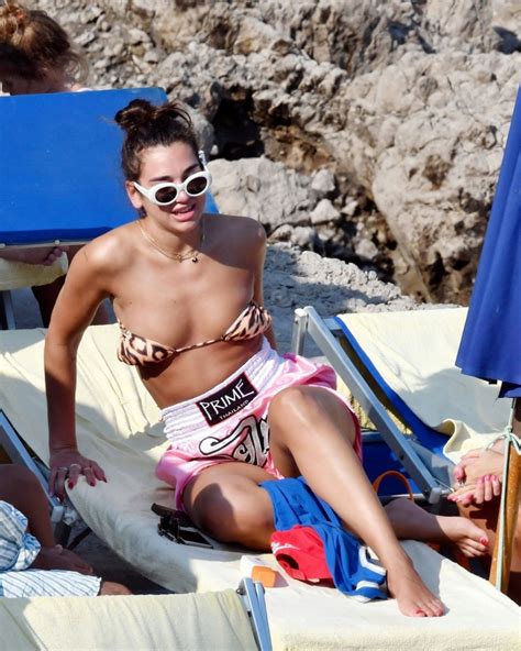 Dua Lipa In Bikini Top Sunbathing On Summer Holiday In Capri